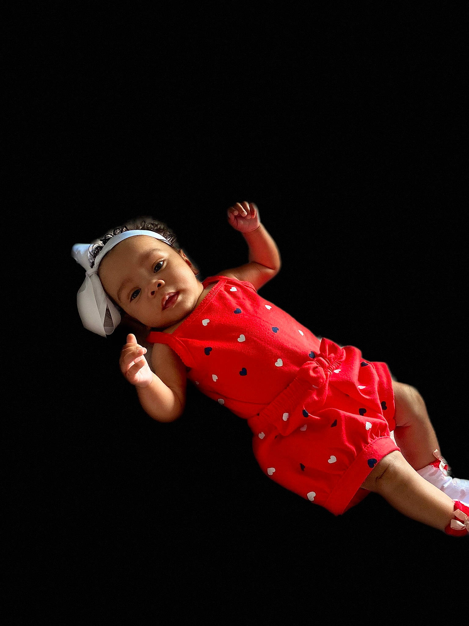 Jae'Laa is registered to the contest to win money with this photo: baby, child, dance, flash_photography, performance, person, photo_shoot, photography, red, smile, toddler