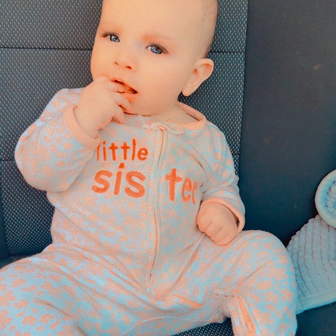 Savannah joined the competition — help win amazing prizes! baby, bodypart, chair, clothing, couch, cushion, face, finger, furniture, hand, head, homedecor, jeans, longsleeve, pants, person, photography, portrait, sitting, t_shirt