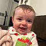 Cambreigh is registered to the contest to win money with this photo: baby, child, smiling, face, blanket, clothing, indoor, couch, happy, person, head, portrait, toddler, hair, fabric, furniture, room, wall, decor, cute