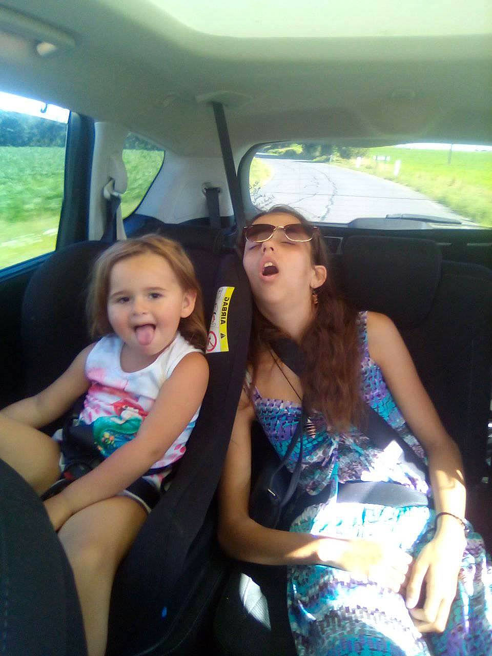 Clara a rejoint le concours — aidez-le/la à gagner de superbes lots ! automotive_exterior, car, car_seat, car_seat_cover, cool, dress, event, family_car, friendship, fun, happy, leisure, motor_vehicle, person, recreation, sitting, steering_wheel, summer, thigh, toddler