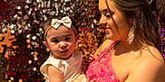 Camaria joined the competition — help win amazing prizes! baby, child, woman, dress, balloons, party, celebration, headband, tattoo, earrings, smile, holding, portrait, sequins, background, event, happy, people, fashion, indoor