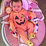 Everleigh joined the competition — help win amazing prizes! baby, infant, onesie, pumpkin, orange_clothing, baby_seat, plush_toy, sun_toy, carpet, smile, cute, indoor, child, footwear, yellow_slippers, face, happy, comfort, soft, pink