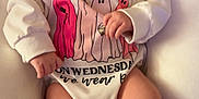 Everleigh is registered to the contest to win money with this photo: baby, child, infant, onesie, socks, cushion, blanket, face, legs, patterned, colorful, soft, cute, indoors, portrait, clothing, resting, babywear, playful, expression