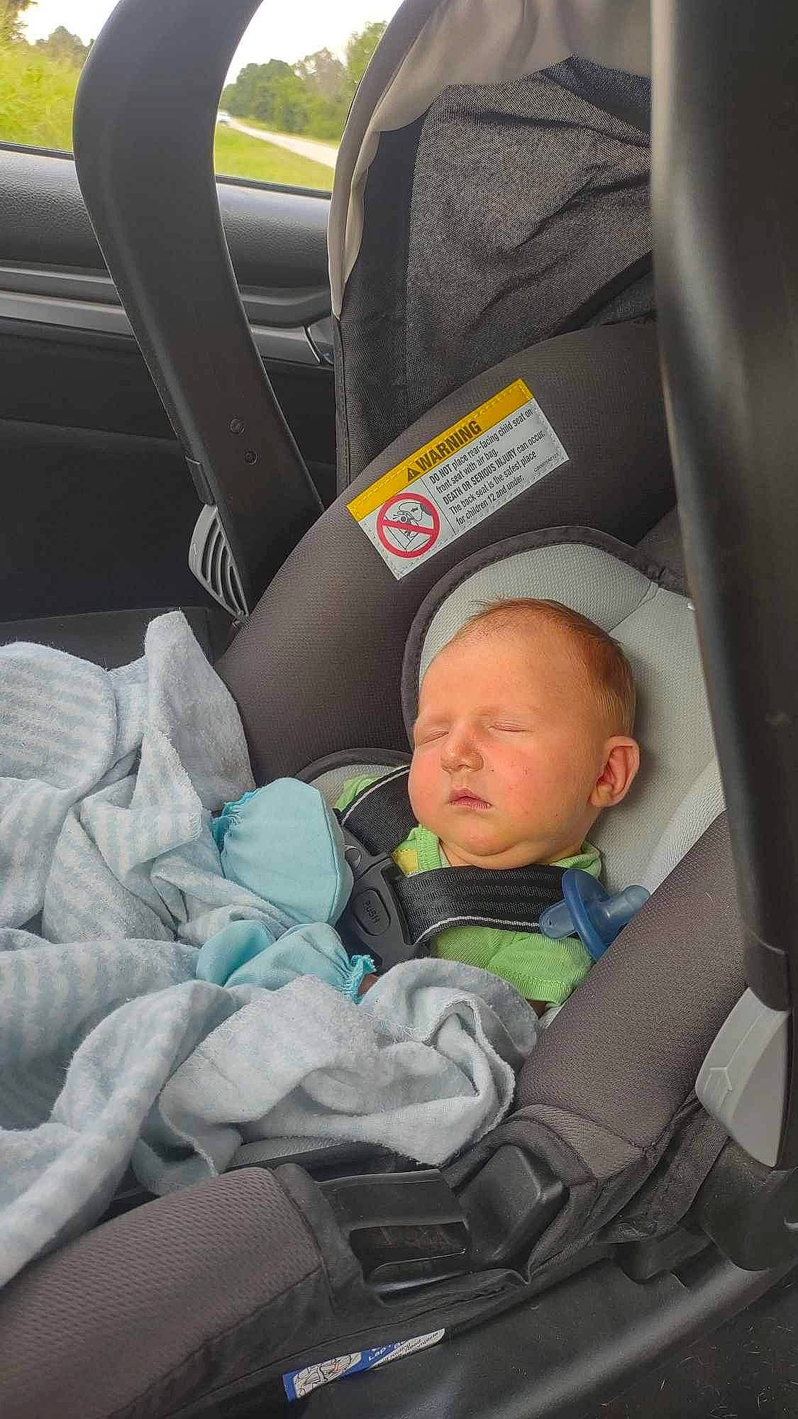Jayke is registered to the contest to win money with this photo: auto_part, automotive_design, baby, baby_carriage, baby_in_car_seat, baby_products, car, car_seat, car_seat_cover, comfort, family_car, head, head_restraint, luxury_vehicle, motor_vehicle, passenger, person, seat_belt, toddler, vehicle