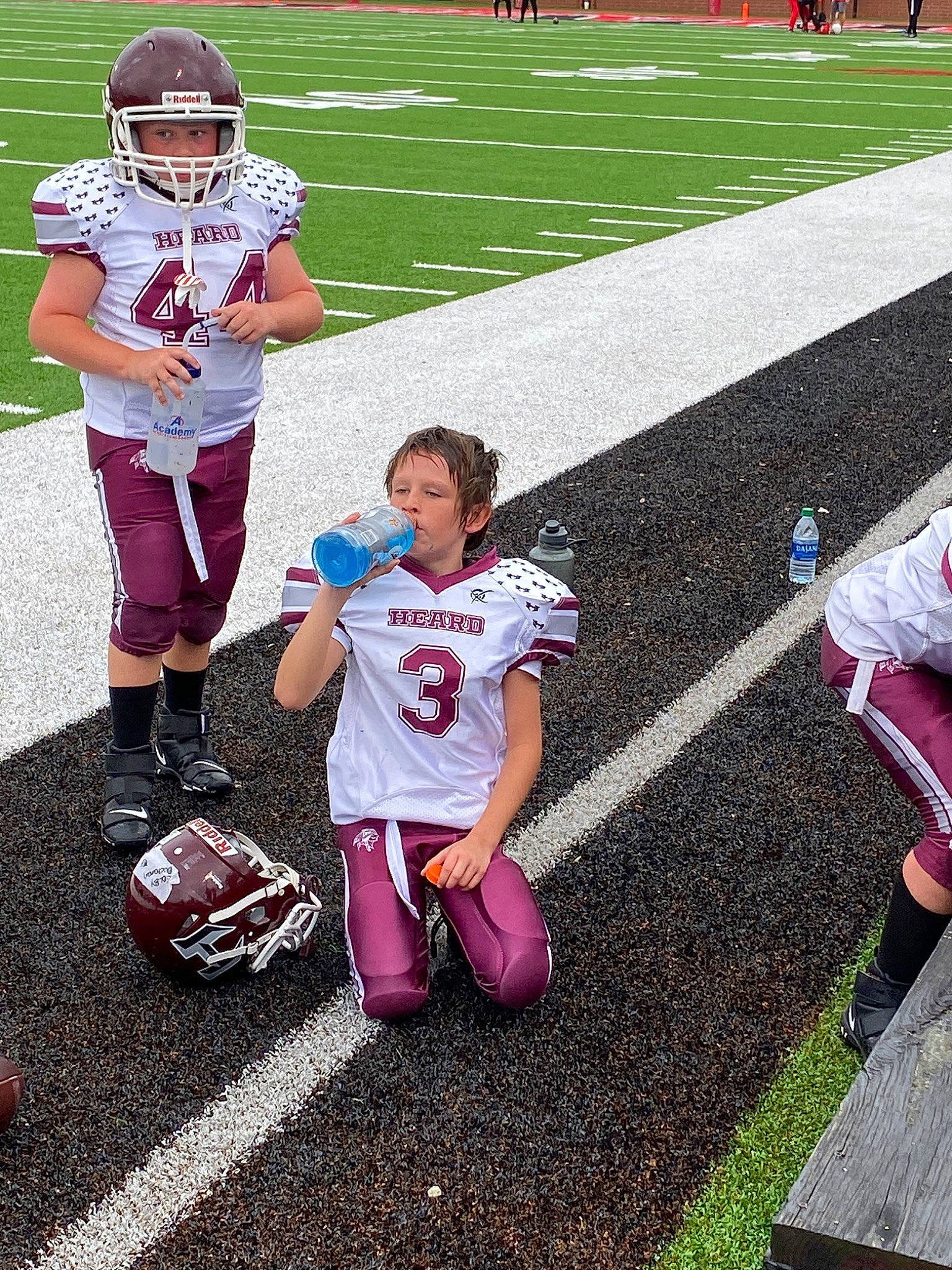 Colby joined the competition — help win amazing prizes! american_football, canadian_football, face_mask, football_equipment, football_gear, football_helmet, grass, gridiron_football, headwear, helmet, jersey, person, player, shorts, sneakers, sports_equipment, sports_gear, sports_uniform, sportswear, sprint_football