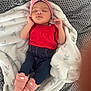 baby, bed, blanket, bonnet, cap, clothing, couch, face, furniture, glove, hat, head, hosiery, newborn, pants, person, photography, portrait, sleeping, sock