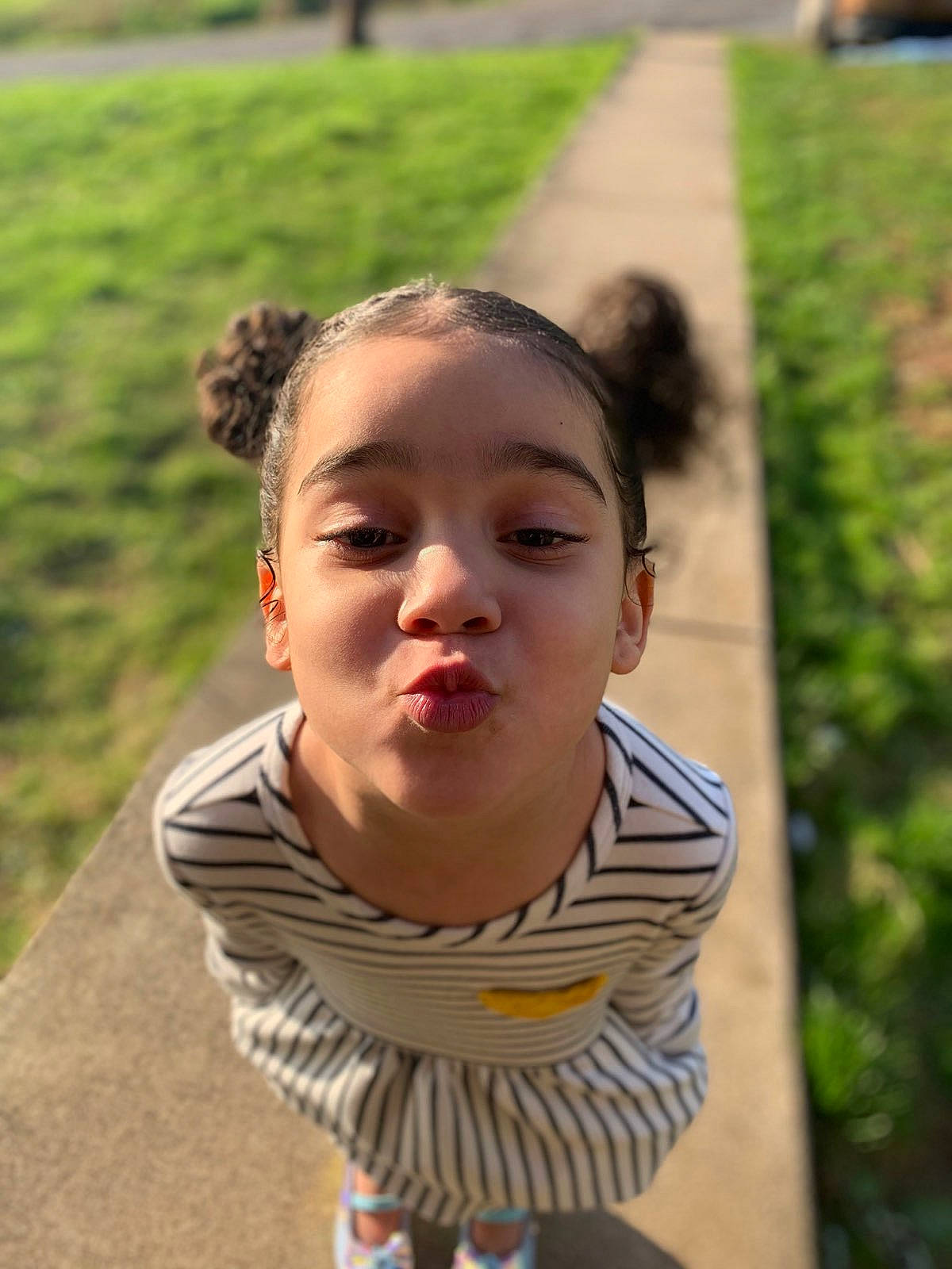 Royal is registered to the contest to win money with this photo: child, chin, face, fun, grass, head, leisure, mouth, nose, person, smile, summer, toddler, vacation