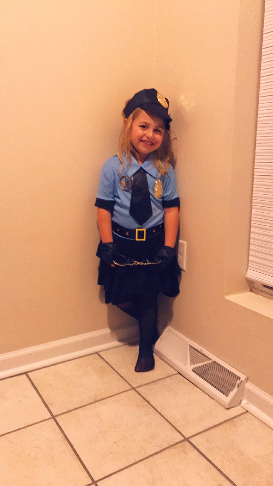 Mackenzie is registered to the contest to win money with this photo: floor, flooring, jeans, joint, joy, person, photography, room, shoulder, standing, tile