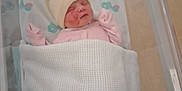 Oaklynn-Ayla joined the competition — help win amazing prizes! baby, bed, blanket, child, crib, cute, hat, hospital_bassinet, indoor, infant, newborn, pacifier, person, pink_clothing, rest, sleeping, soft, white_blanket, wrapped, young