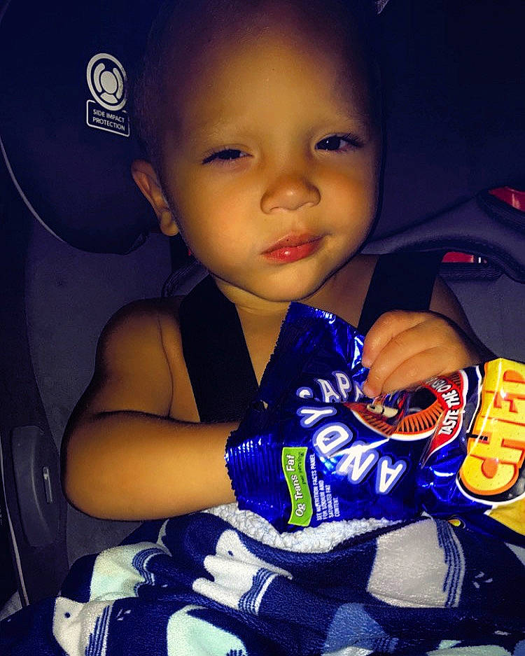 Trayvon is registered to the contest to win money with this photo: black_hair, cheek, child, cool, eye, happy, person, photography, play, smile, space, toddler, world