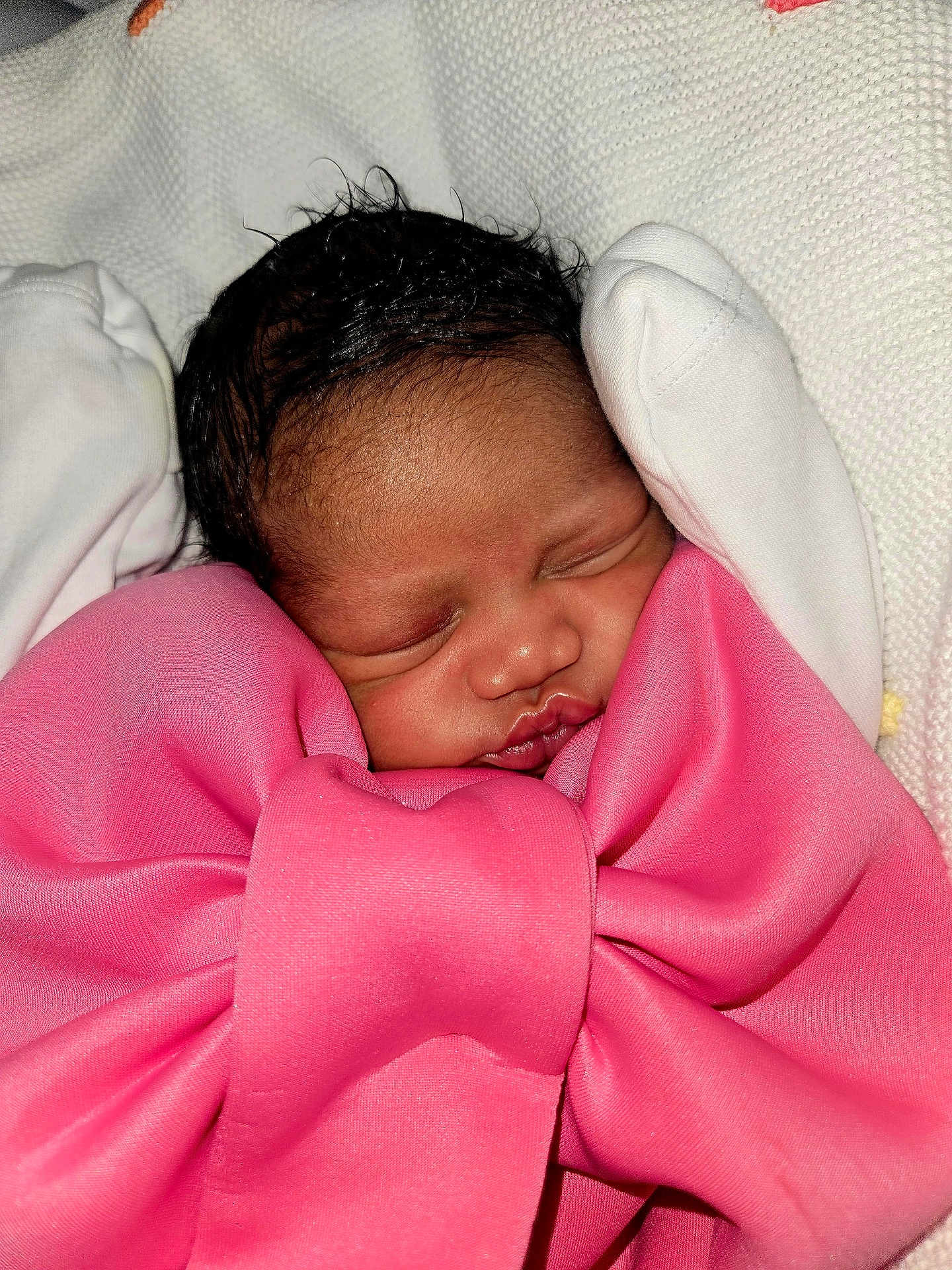 Esther joined the competition — help win amazing prizes! newborn, baby, sleeping, pink_bow, blanket, closeup, infant, face, wrapped, soft, cute, peaceful, portrait, child, clothing, fabric, resting, indoor, head, person