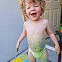 Jared Blodgett joined the competition — help win amazing prizes! toddler, child, curly_hair, diaper, chalk_paint, colorful, smiling, outdoor, concrete_floor, stencils, chalk, playful, happy, bare_chest, feet, door, pump, hand_painted, messy, fun