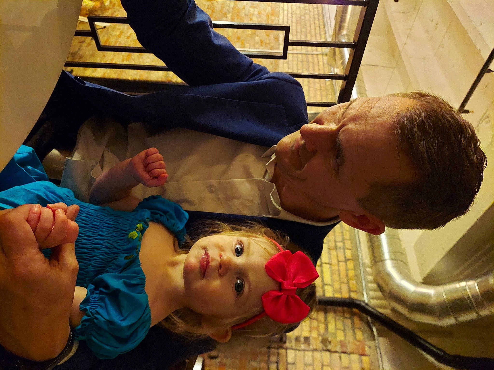 Maura is registered to the contest to win money with this photo: arm, art, baby, baby_products, child, event, facial_expression, fun, gesture, hand, happy, headwear, leisure, mouth, people, person, room, service, smile, snapshot