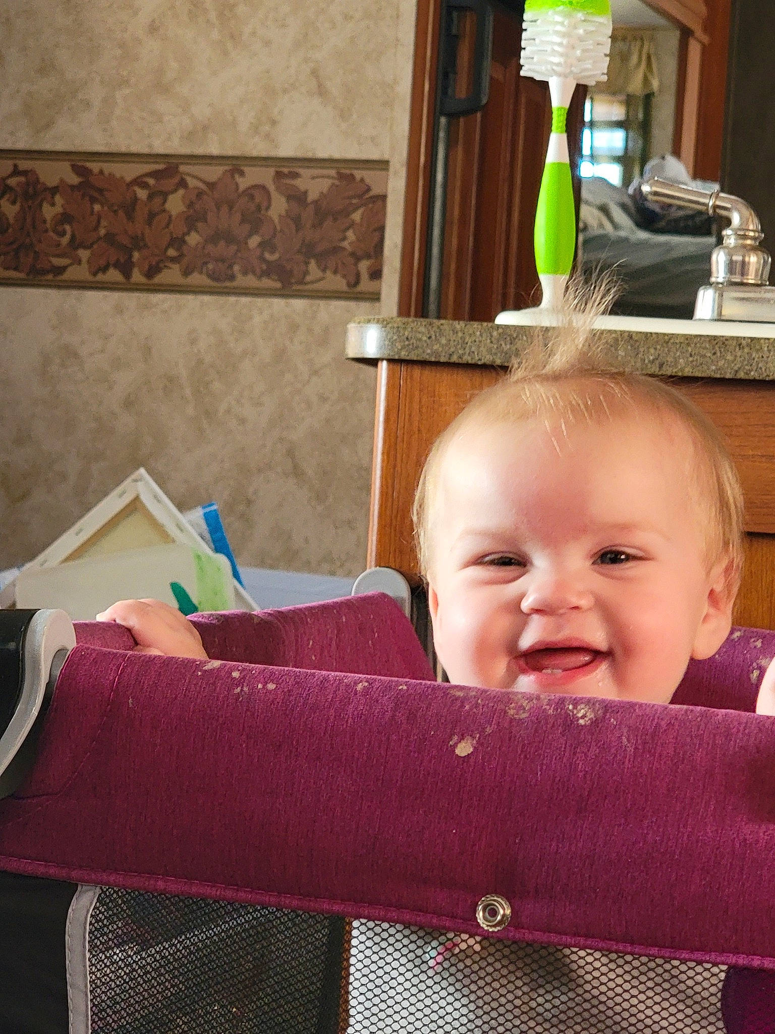 Preslie joined the competition — help win amazing prizes! baby, baby_products, baby_safety, baby_toddler_clothing, cheek, child, comfort, desk, flooring, happy, infant_bed, joy, linens, magenta, person, product, room, sitting, smile, textile