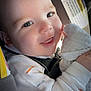 Liam joined the competition — help win amazing prizes! baby, child, smiling, face, car_seat, safety_harness, blanket, clothing, infant, cute, happy, portrait, seatbelt, indoors, closeup, person, expression, soft_light, warning_label, snuggle