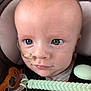 Adam is registered to the contest to win money with this photo: baby, infant, face, eyes, pacifier, feeding_tube, car_seat, clip, closeup, expression, skin, child, young, cute, human, portrait, seatbelt, tape, comfort, indoors