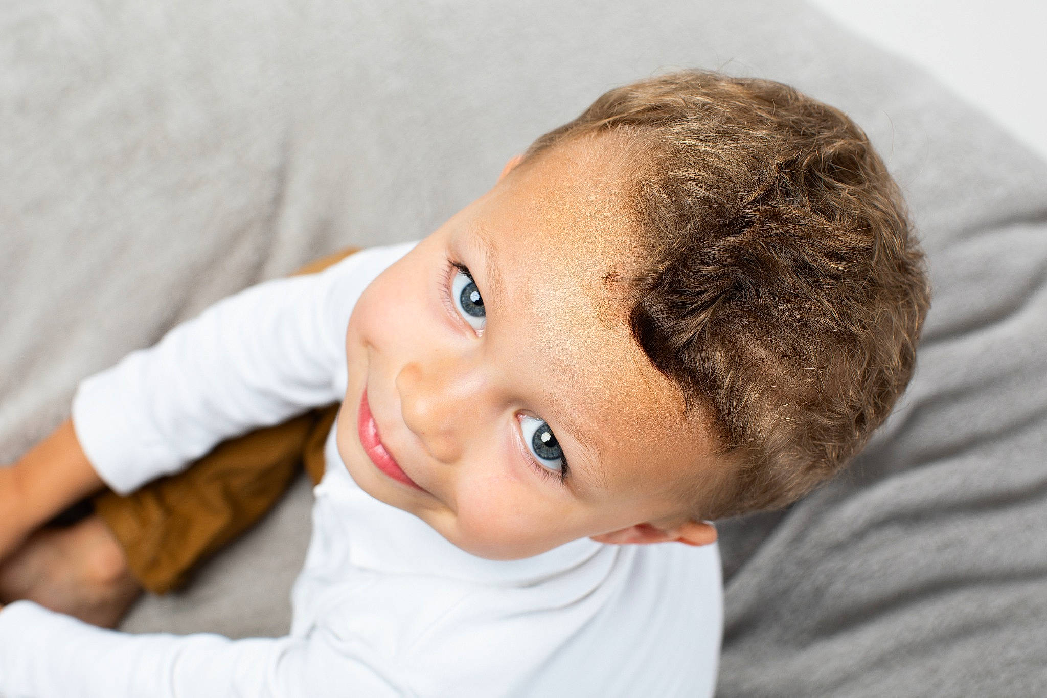 Maël participe au concours pour gagner de l'argent avec cette photo : baby, cheek, child, comfort, ear, eyebrow, eyelash, flash_photography, gesture, happy, laugh, nose, person, portrait_photography, room, sitting, sleeve, smile, toddler