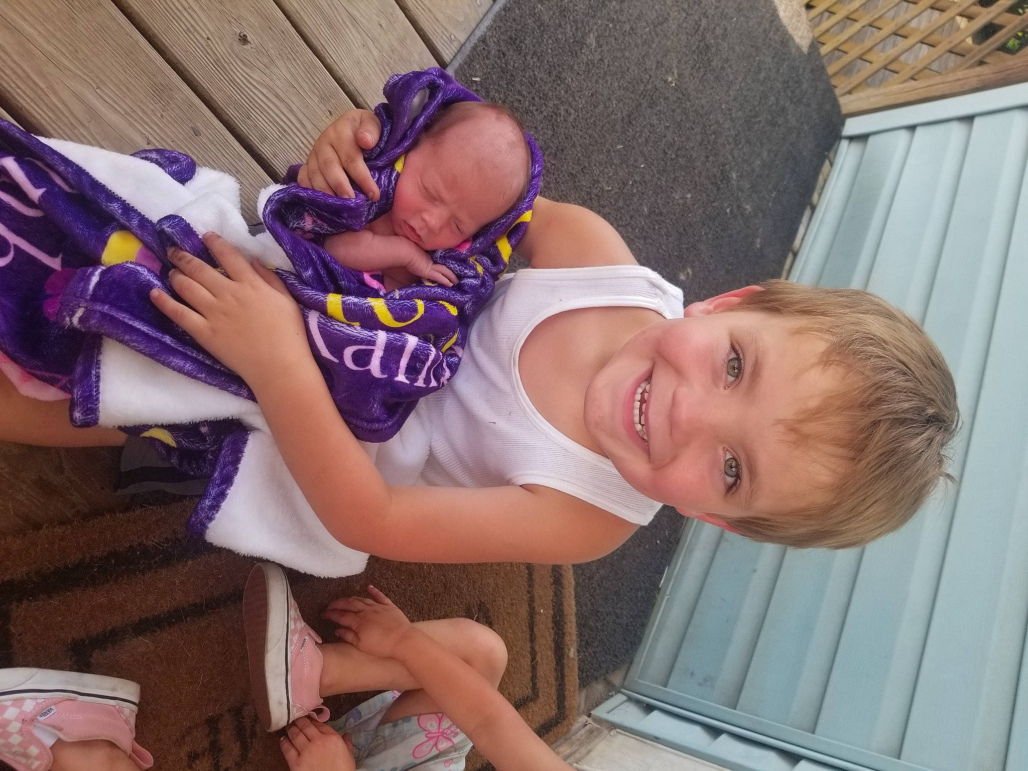 Richard joined the competition — help win amazing prizes! baby, baby_toddler_clothing, child, eyewear, fun, happy, hat, human_leg, joy, leg, leisure, mouth, person, sandal, shorts, sitting, smile, sunglasses, t_shirt, thigh