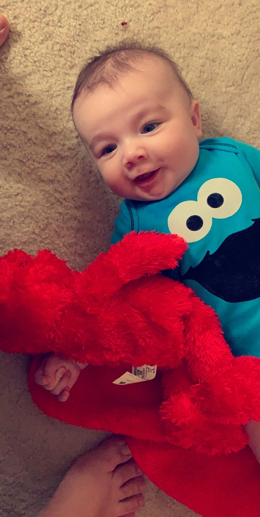 Braden joined the competition — help win amazing prizes! baby, baby_products, baby_toys, blue, cheek, child, face, head, lip, mouth, nose, person, pink, play, plush, red, skin, stuffed_toy, textile, toddler