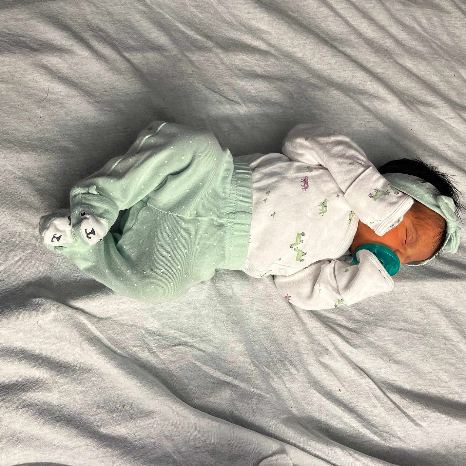 Kehlani joined the competition — help win amazing prizes! baby, baby_sleeping, bed, bed_sheet, bedding, bedroom, bedtime, blanket, child, comfort, grass, grey, human_leg, linens, nap, room, sleep, sleeve, t_shirt, wood