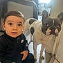 Gabriel a rejoint le concours — aidez-le/la à gagner de superbes lots ! animal, black_clothing, casual, child, couch, curious, cute, dog, expression, floor, french_bulldog, home, indoor, nike, pet, seated, tile_floor, toddler, window_light, young_child