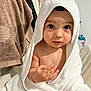 baby, bathroom, child, comfort, curious, cute, expression, eyes, face, hand, hooded_towel, indoors, infant, person, sitting, skin, soft, towel, white_towel, wrapped