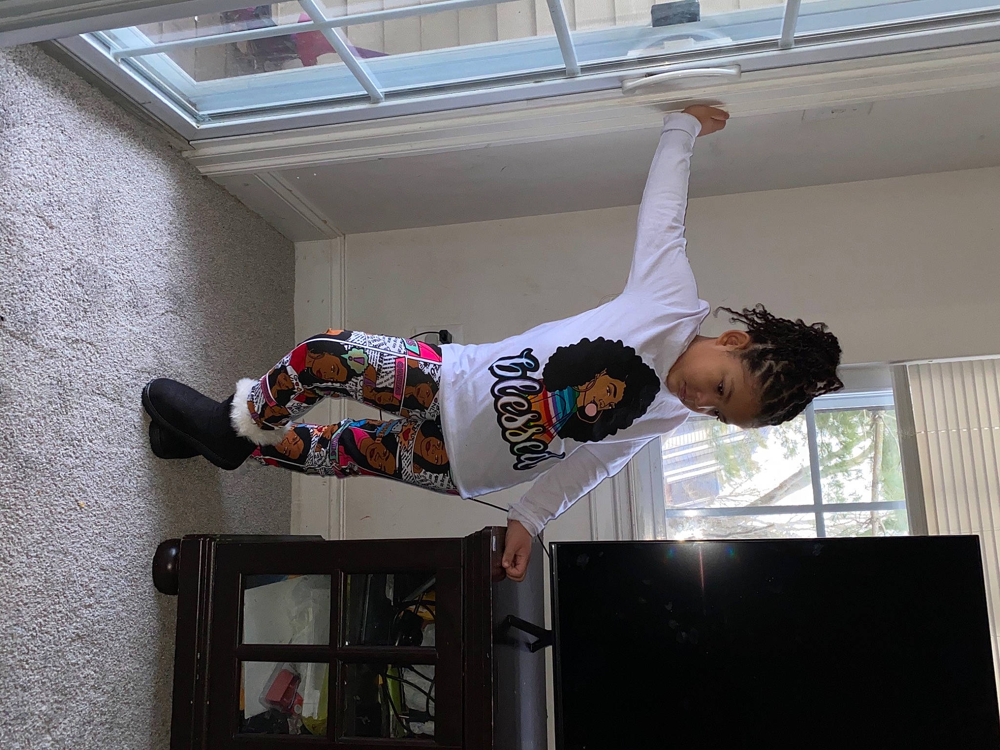 Aryanna joined the competition — help win amazing prizes! adventure, arm, balance, ceiling, competition, dance, event, fashion_design, fun, person, recreation, room, sportswear, t_shirt, window