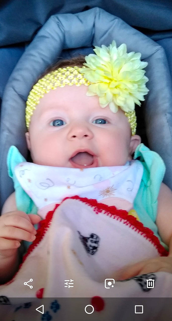 Kiera is registered to the contest to win money with this photo: baby, cheek, child, hair_accessory, headgear, mouth, skin, smile, toddler