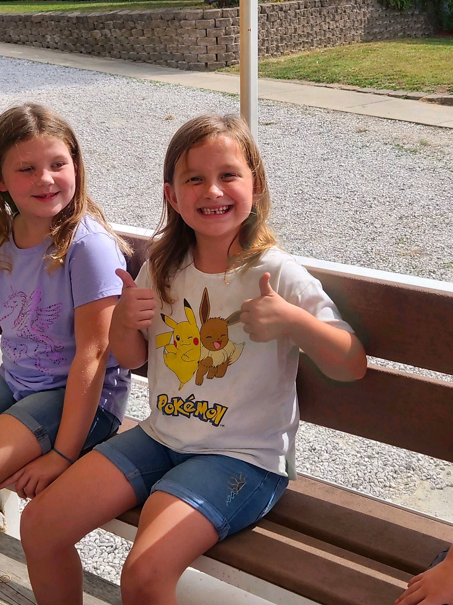 Kaylee is registered to the contest to win money with this photo: blond, child, face, fun, grass, happy, human_leg, joy, leg, leisure, person, photograph, recreation, shorts, skin, smile, snapshot, standing, summer, t_shirt