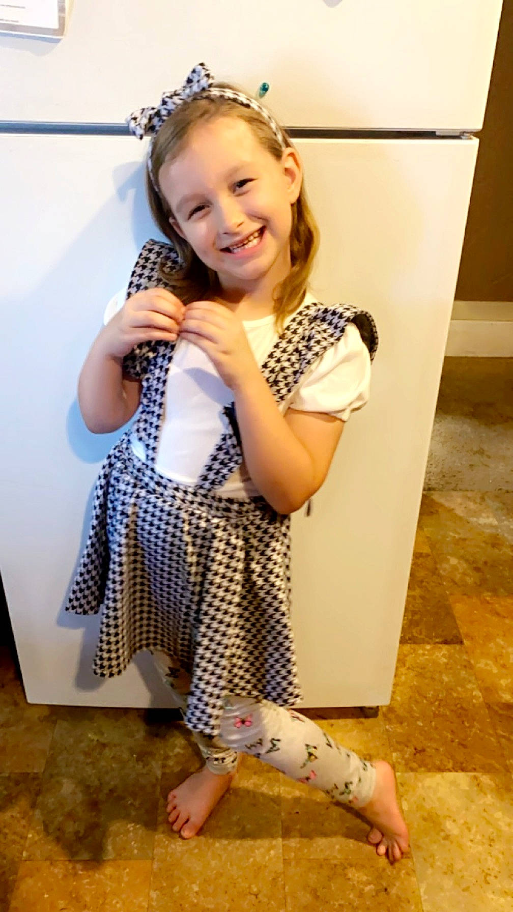 Kaylee joined the competition — help win amazing prizes! audio_equipment, baby_toddler_clothing, bag, child, fashion_accessory, flooring, happy, human_leg, jewellery, joy, knee, neck, pattern, person, skin, sleeve, smile, standing, t_shirt, thigh