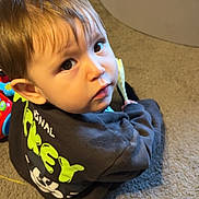 Jaxon joined the competition — help win amazing prizes! toddler, child, carpet, toy, ball_pit, sweatshirt, mickey_mouse, indoor, playtime, curious, face, person, floor, colorful, plastic, hand, looking_up, young_child, cute, home