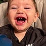 Jaxon joined the competition — help win amazing prizes! toddler, child, laughing, smiling, teeth, sippy_cup, high_chair, messy, face, hand, clothing, indoor, happy, baby, person, cute, young_child, seat, pattern, feeding