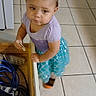 Miracle joined the competition — help win amazing prizes! toddler, child, girl, purple_bow, headband, purple_top, blue_skirt, mermaid_skirt, cookie, open_drawer, cables, electronic_equipment, tiled_floor, indoor, curious_expression, standing, footwear, person, looking_up, home