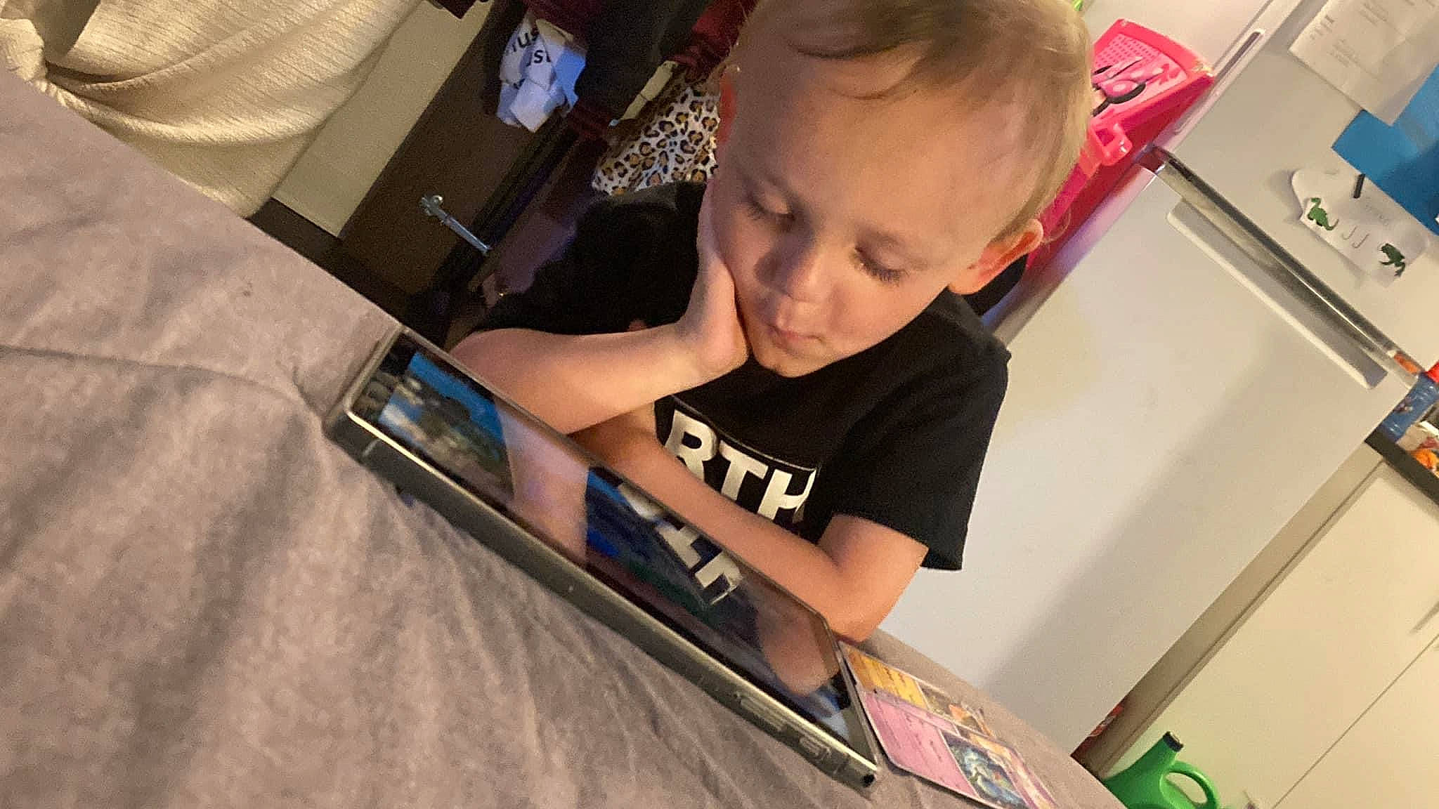 Joseph Jr joined the competition — help win amazing prizes! audio_equipment, automotive_design, baby, child, communication_device, eyewear, flooring, fun, gadget, learning, netbook, office_equipment, office_supplies, person, portable_communications_device, room, sitting, t_shirt, tablet_computer, toddler