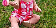 Ayeslynn is registered to the contest to win money with this photo: baby, bodypart, clothing, dress, face, finger, flower, footwear, grass, hand, hat, head, lawn, person, photography, plant, portrait, rose, shoe, sitting