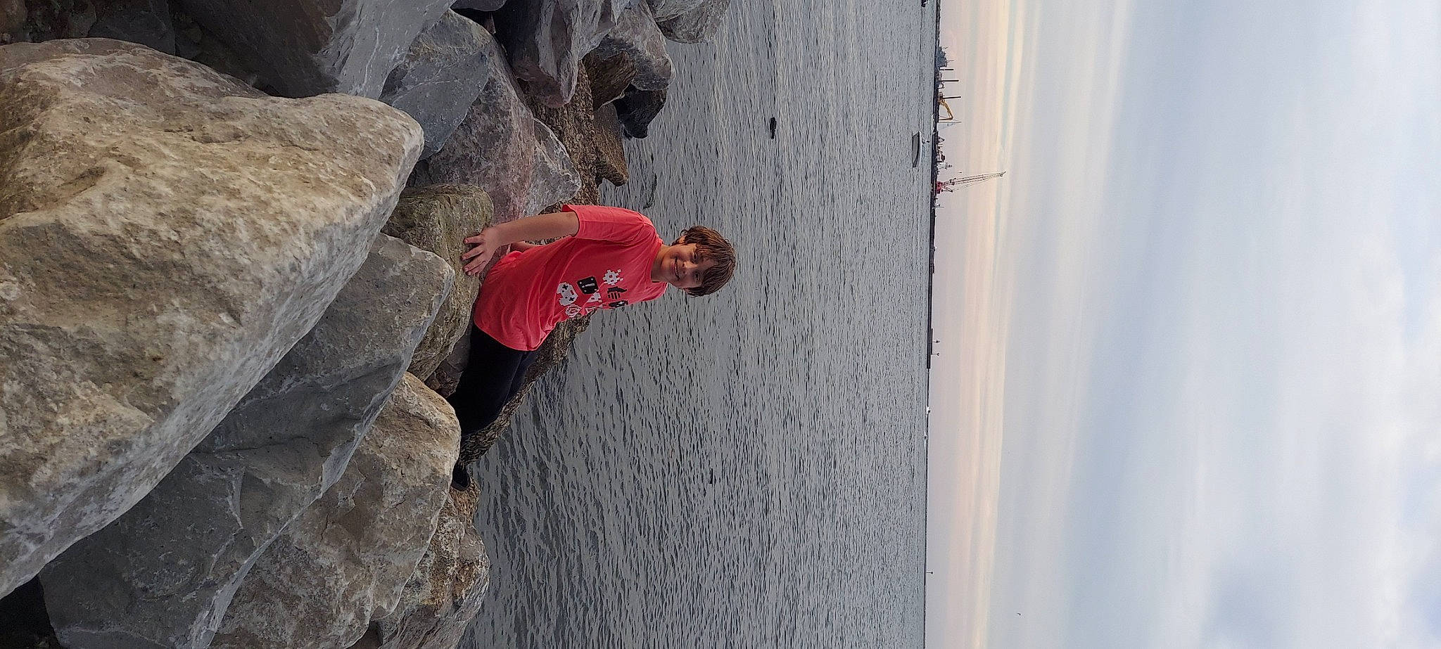 Josiah is registered to the contest to win money with this photo: adventure, batholith, beach, bedrock, climbing, concrete, fault, formation, fun, joy, klippe, lake, leisure, outcrop, person, recreation, rock, rock_climbing_equipment, sky, sport_climbing