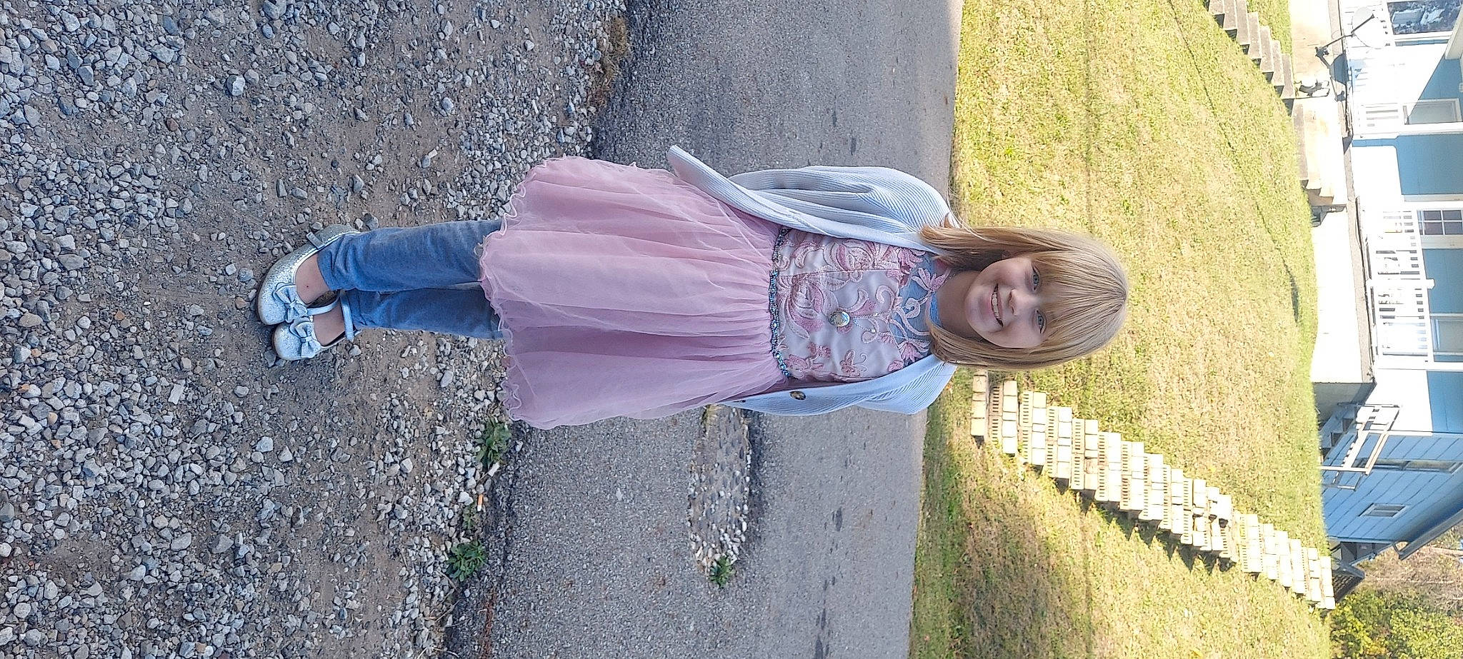 Lillian joined the competition — help win amazing prizes! asphalt, concrete, denim, electric_blue, fun, grass, human_leg, joy, leisure, pattern, people_in_nature, person, plant, road_surface, shadow, sidewalk, smile, textile, walking_shoe