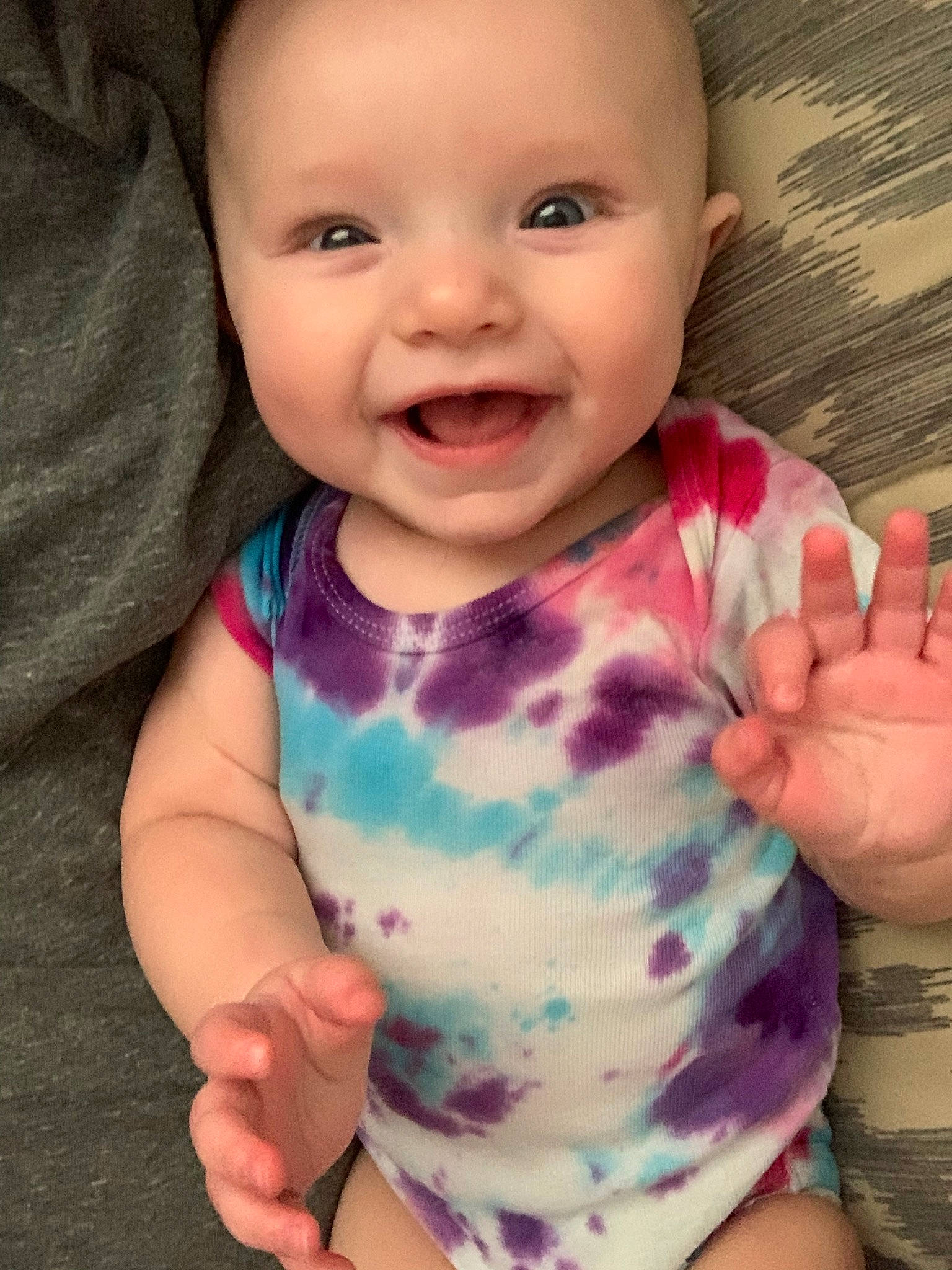 Leighton is registered to the contest to win money with this photo: baby, baby_toddler_clothing, cheek, child, eye, face, facial_expression, finger, gesture, hand, happy, head, iris, lip, mouth, nose, person, skin, smile, thumb