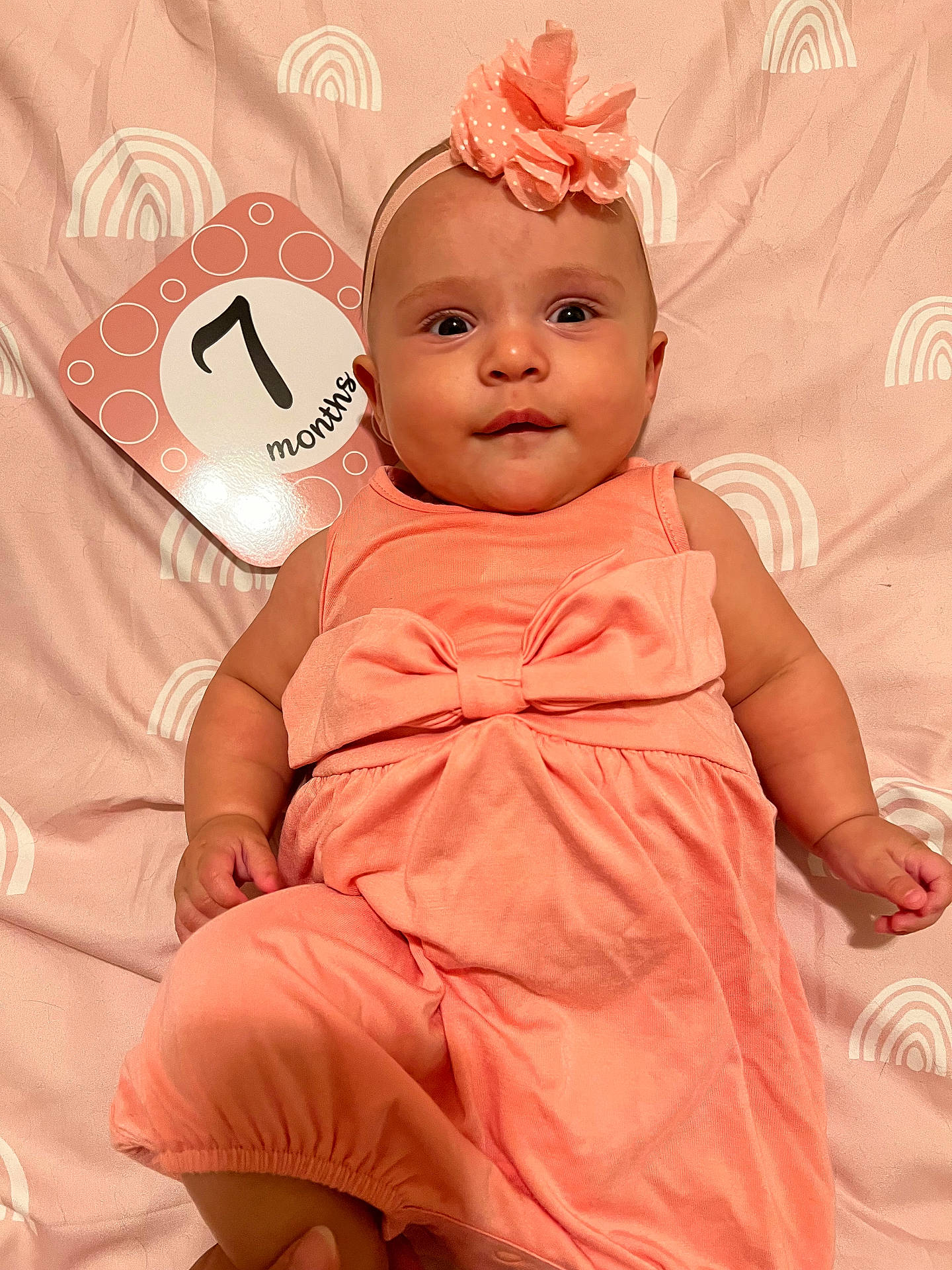 Seraphina joined the competition — help win amazing prizes! accessories, baby, bodypart, clothing, dress, eveningdress, face, finger, flower, formalwear, hand, hat, head, headband, homedecor, newborn, person, photography, portrait, sitting