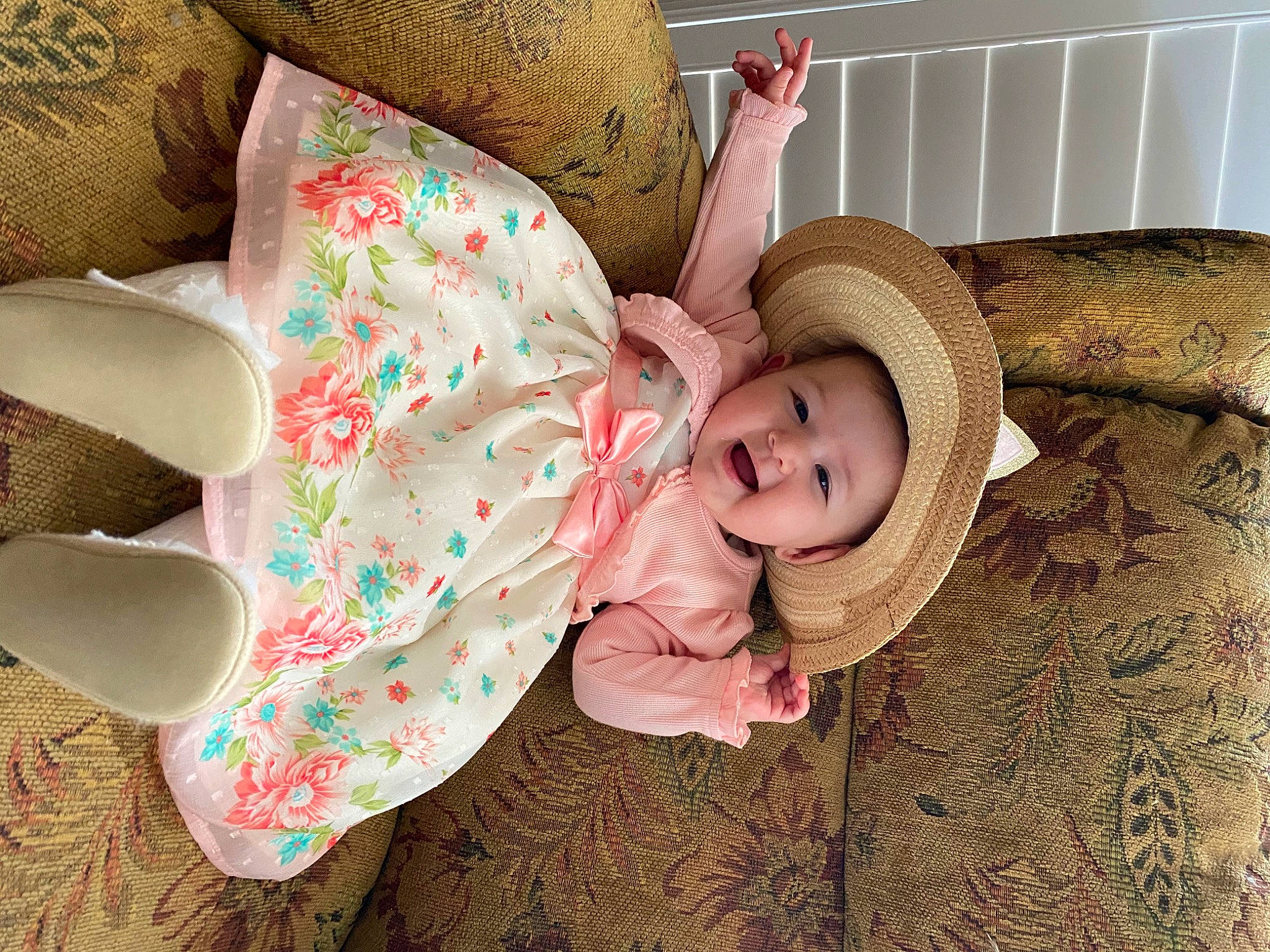 Syndel is registered to the contest to win money with this photo: baby, baby_products, baby_safety, baby_sleeping, baby_toddler_clothing, child, comfort, couch, happy, headgear, headwear, human_body, infant_bed, linens, pattern, person, pink, sitting, smile, textile