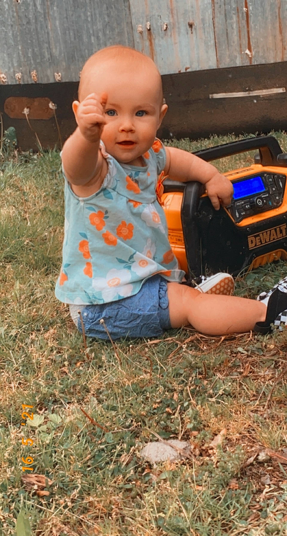 Baelynn is registered to the contest to win money with this photo: automotive_lighting, baby, baby_toddler_clothing, bag, bumper, child, fun, grass, happy, landscape, luggage_and_bags, people_in_nature, person, plant, play, sitting, soil, t_shirt, toddler, vehicle_door