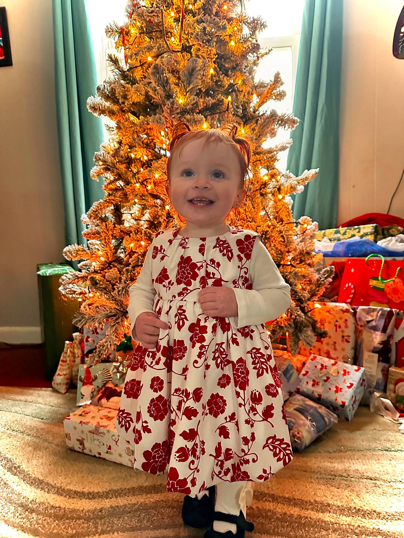 Wrenley joined the competition — help win amazing prizes! baby_toddler_clothing, boot, child, christmas, christmas_decoration, christmas_ornament, christmas_tree, event, flooring, fun, happy, hat, holiday, holiday_ornament, joy, ornament, person, room, smile, toddler