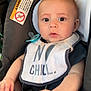 Nathaniel joined the competition — help win amazing prizes! baby, infant, child, car_seat, pacifier, bib, clothing, seat_belt, cute, portrait, child_safety, indoor, person, young_child, baby_boy, expression, face, hands, sitting, closeup