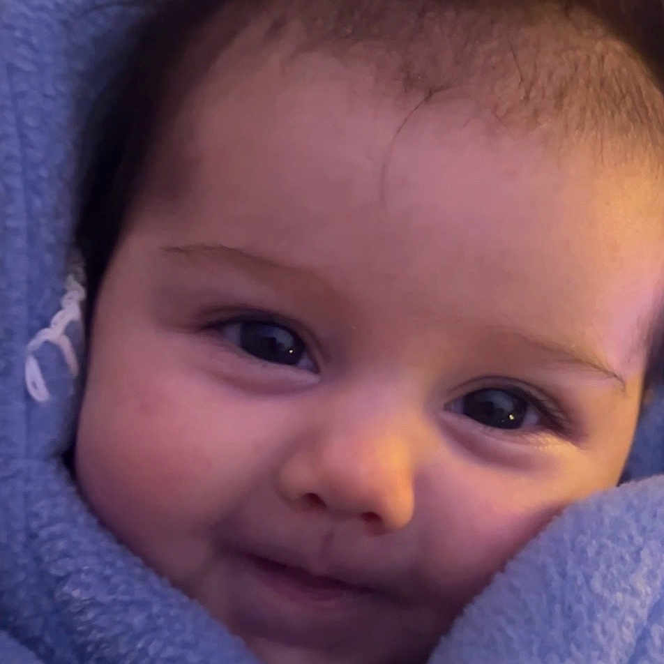 Mable Moon joined the competition — help win amazing prizes! adorable, baby, blanket, blue, child, closeup, comfort, cozy, cute, expression, eyes, face, infant, portrait, skin, smile, soft, warm, wrapped, young