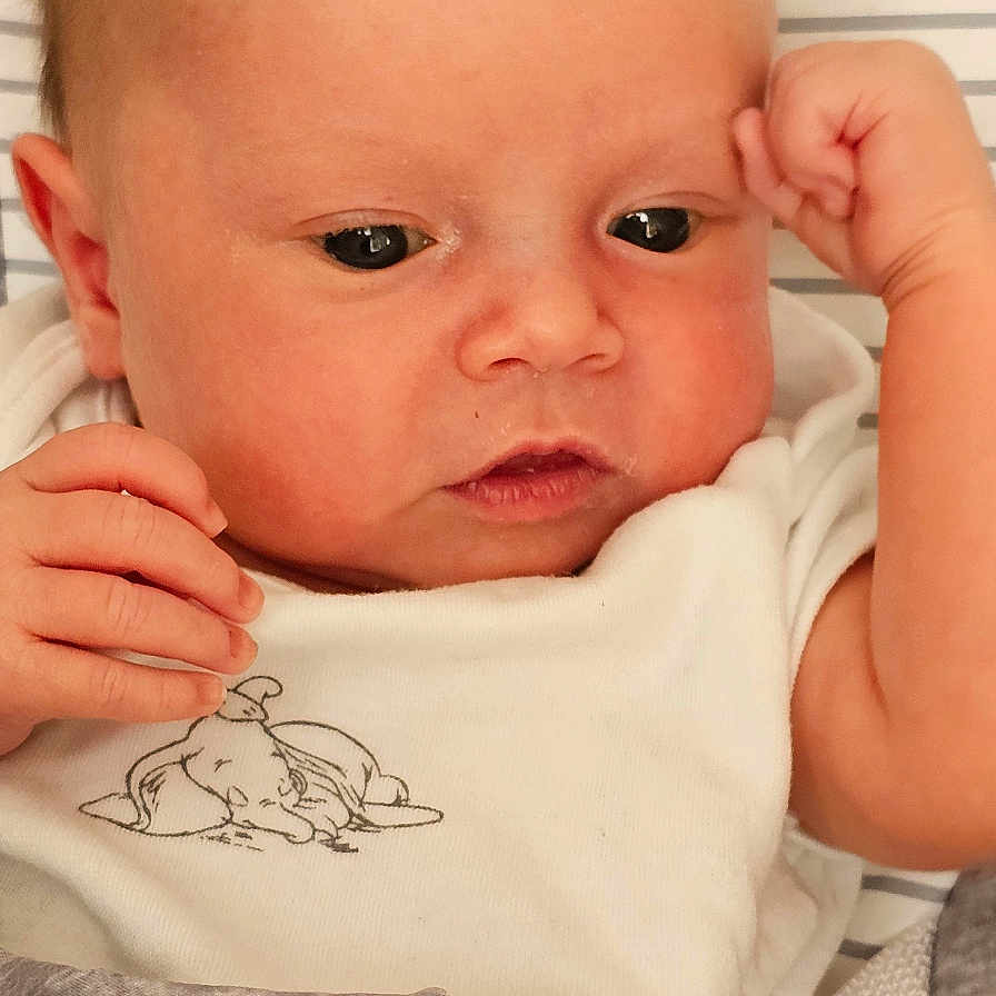 Isobela is registered to the contest to win money with this photo: baby, blanket, bodypart, clothing, cushion, face, finger, hand, head, homedecor, jeans, machine, newborn, pants, person, photography, portrait, quilt, screw, t_shirt