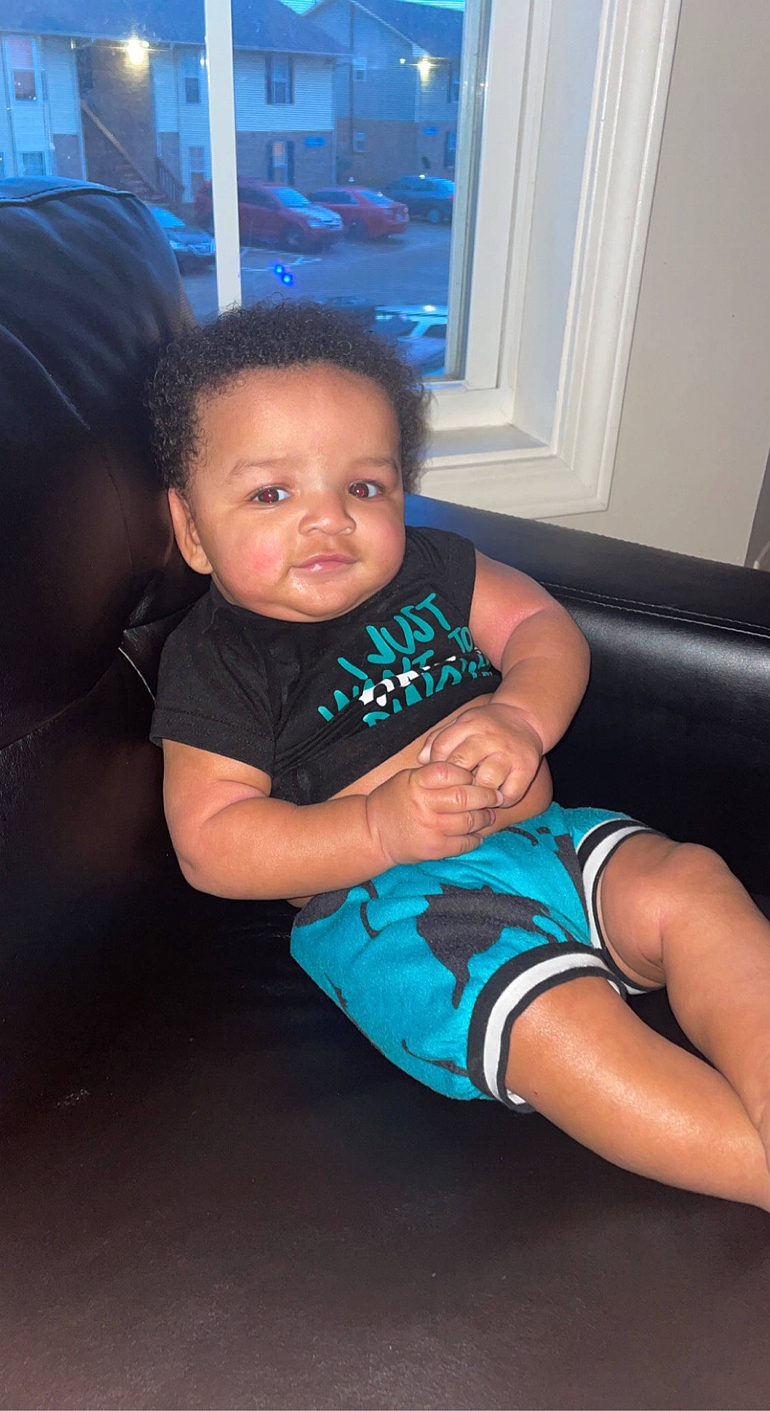 Julius is registered to the contest to win money with this photo: arm, black_hair, blue, comfort, elbow, eye, finger, hairstyle, hand, head, iris, joint, knee, leg, mouth, neck, person, shoulder, skin, thigh