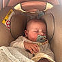Sacha participe au concours pour gagner de l'argent avec cette photo : baby, sleeping, car_seat, pacifier, blanket, child, infant, soft, cozy, peaceful, indoors, comfort, cute, head, face, hand, clothing, beige, rest, toddler