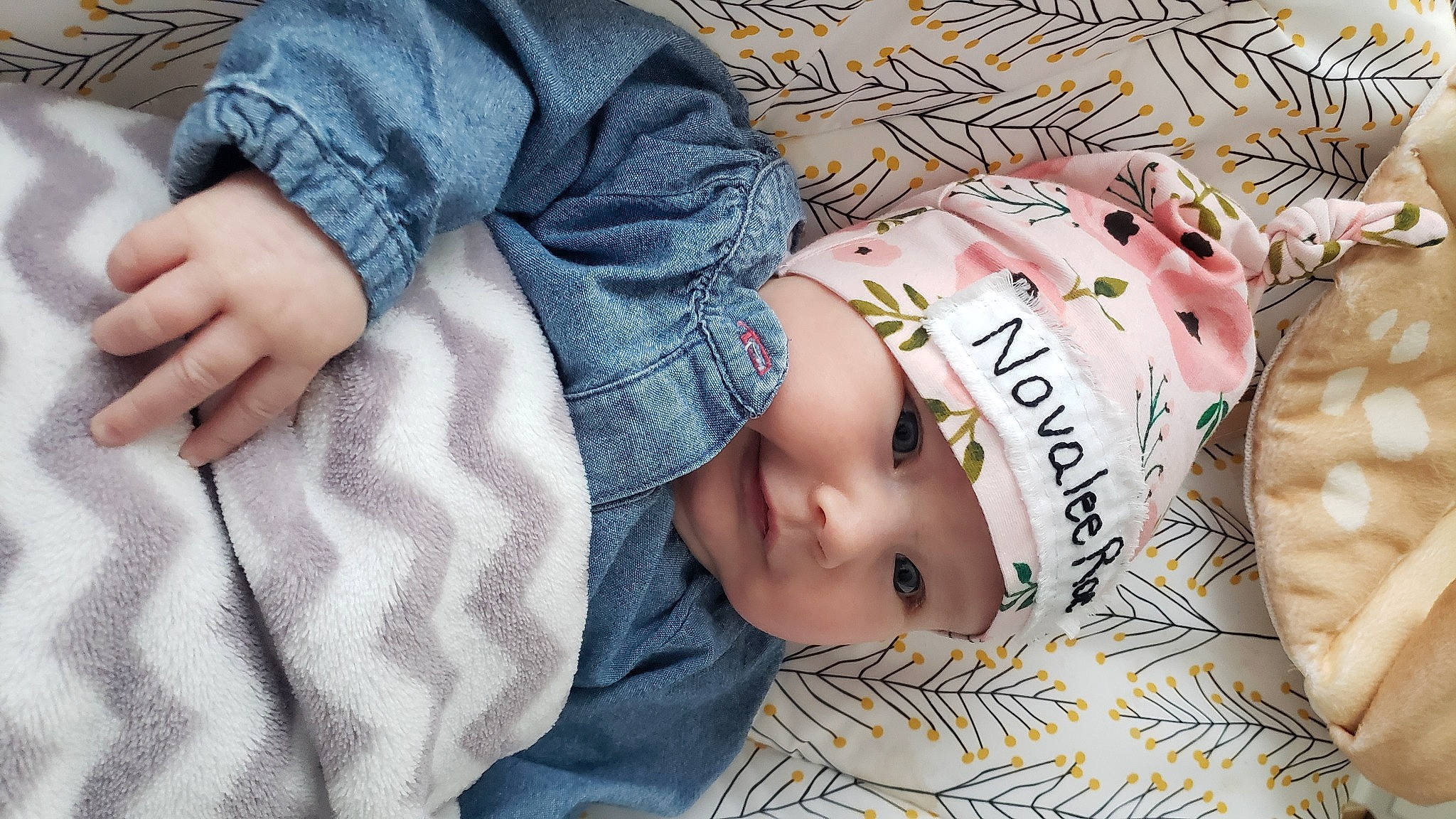 Novalee is registered to the contest to win money with this photo: baby, baby_products, baby_sleeping, baby_toddler_clothing, bedding, bedtime, cheek, child, comfort, fur, headwear, linens, nap, pattern, person, plaid, product, skin, sleep, sleeve