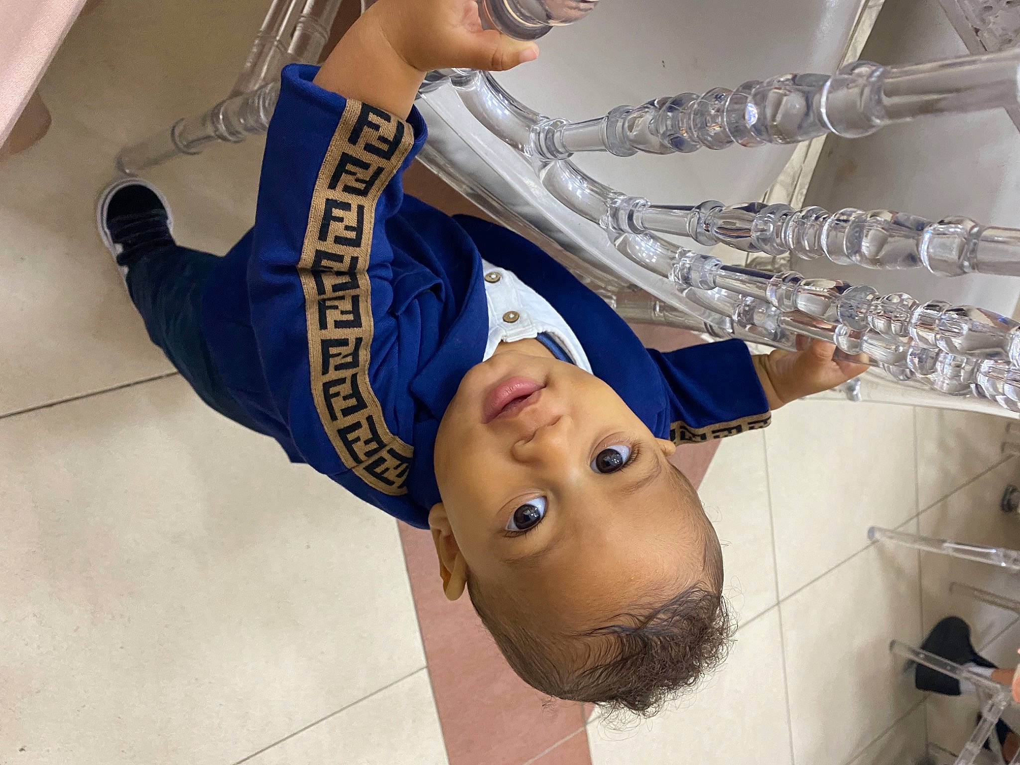 Tyronn participe au concours pour gagner de l'argent avec cette photo : arm, child, elbow, electric_blue, eyelash, eyewear, fashion_accessory, fun, gesture, happy, headgear, human_leg, jaw, jewellery, neck, person, sleeve, sportswear, thigh, uniform