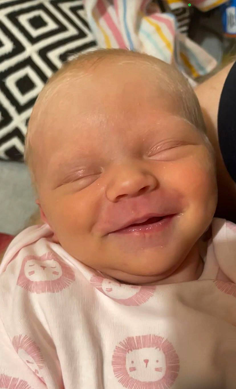 Lillie is registered to the contest to win money with this photo: baby, baby_laughing, baby_toddler_clothing, cheek, child, comfort, eyebrow, happy, iris, jaw, lip, mouth, nose, person, pink, product, skin, sleeve, smile, toddler